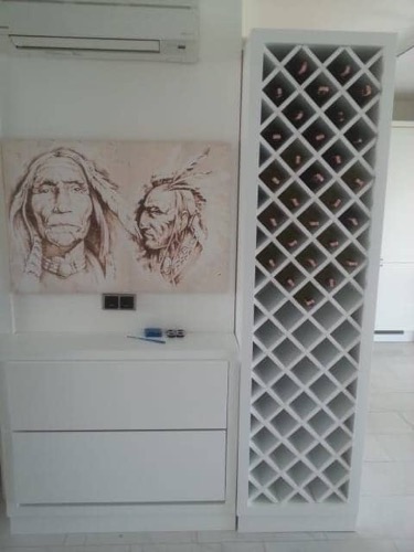 Custom made and designed wine rack unit for private client. Designed and fitted by Ugur Bolat