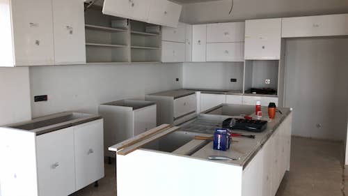 Mid project of high quality, bespoke kitchen for sea view villa (property value in excess of £500k). Kitchen by Mopa in  'Lotus' design, awaiting work top