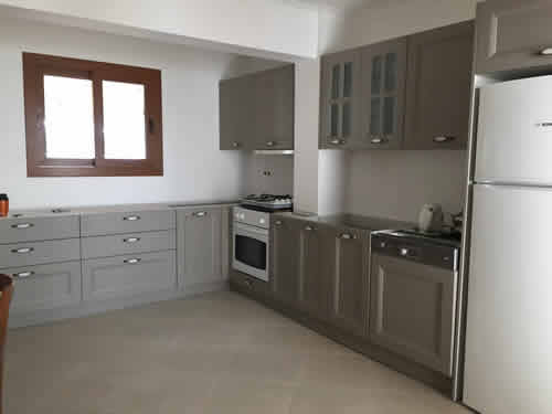 Finished bespoke kitchen for apartment in desirable gated compound. Kitchen by Mopa, in 'Doree' design