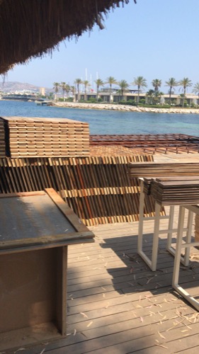 Creating and installing new beach club deck. Repurposed old decking to create new, durable design of deck tiles. Ugur Bolat designed, project managed and oversaw team to install entire deck